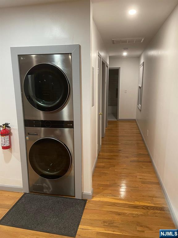 607 Nassau Street, Unit 2 Orange, NJ 07050 - Photo 1 of 10 a view of a hallway with washer and dryer