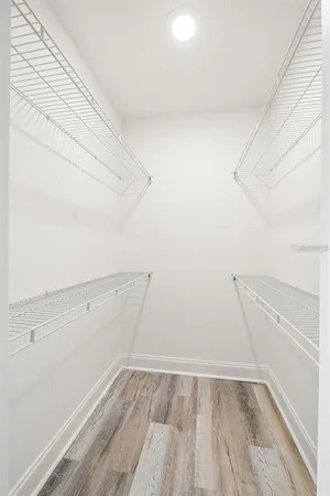 a view of a room with racks on the wall