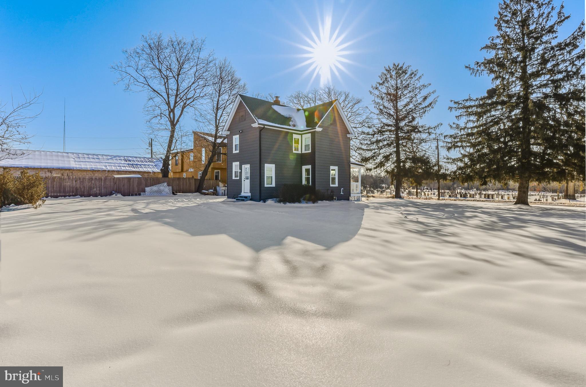 1012 East Walnut Road Vineland, NJ 08360 - Photo 4 of 17 Charming home nestled in a winter wonderland.