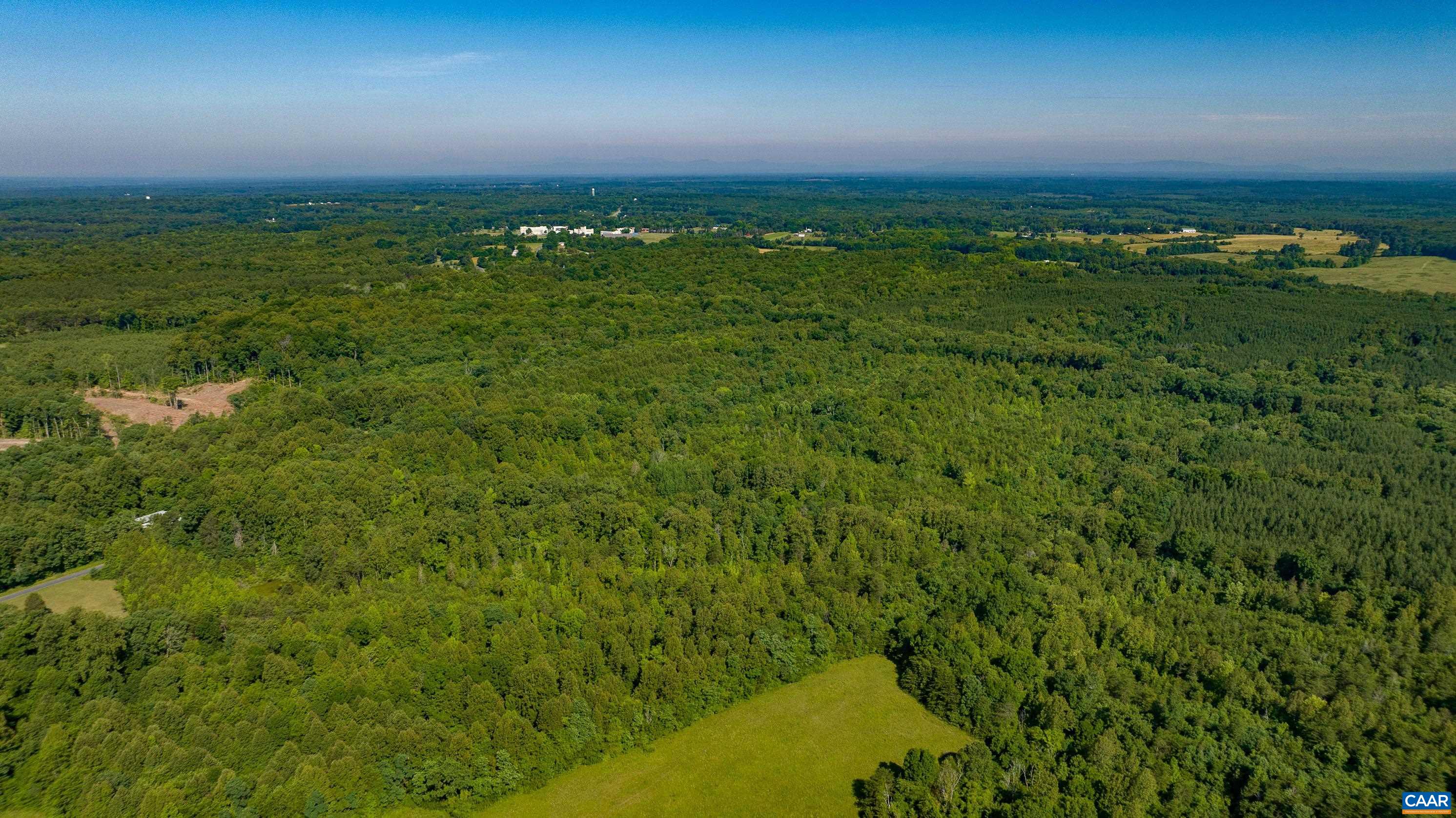Lot 1 Stag Road Bremo Bluff, VA 23022 - Photo 17 of 21 an aerial view of residential houses with outdoor space and trees