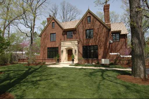 1205 Tower Road Winnetka, IL 60093 - Photo 1 of 1 a front view of a house with a yard