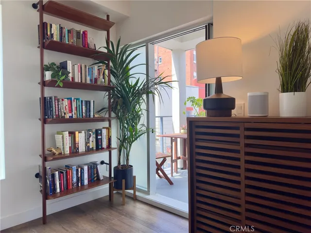 a bathroom with a sink toilet a mirror and shower