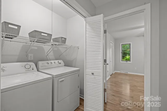 a utility room with dryer and washer