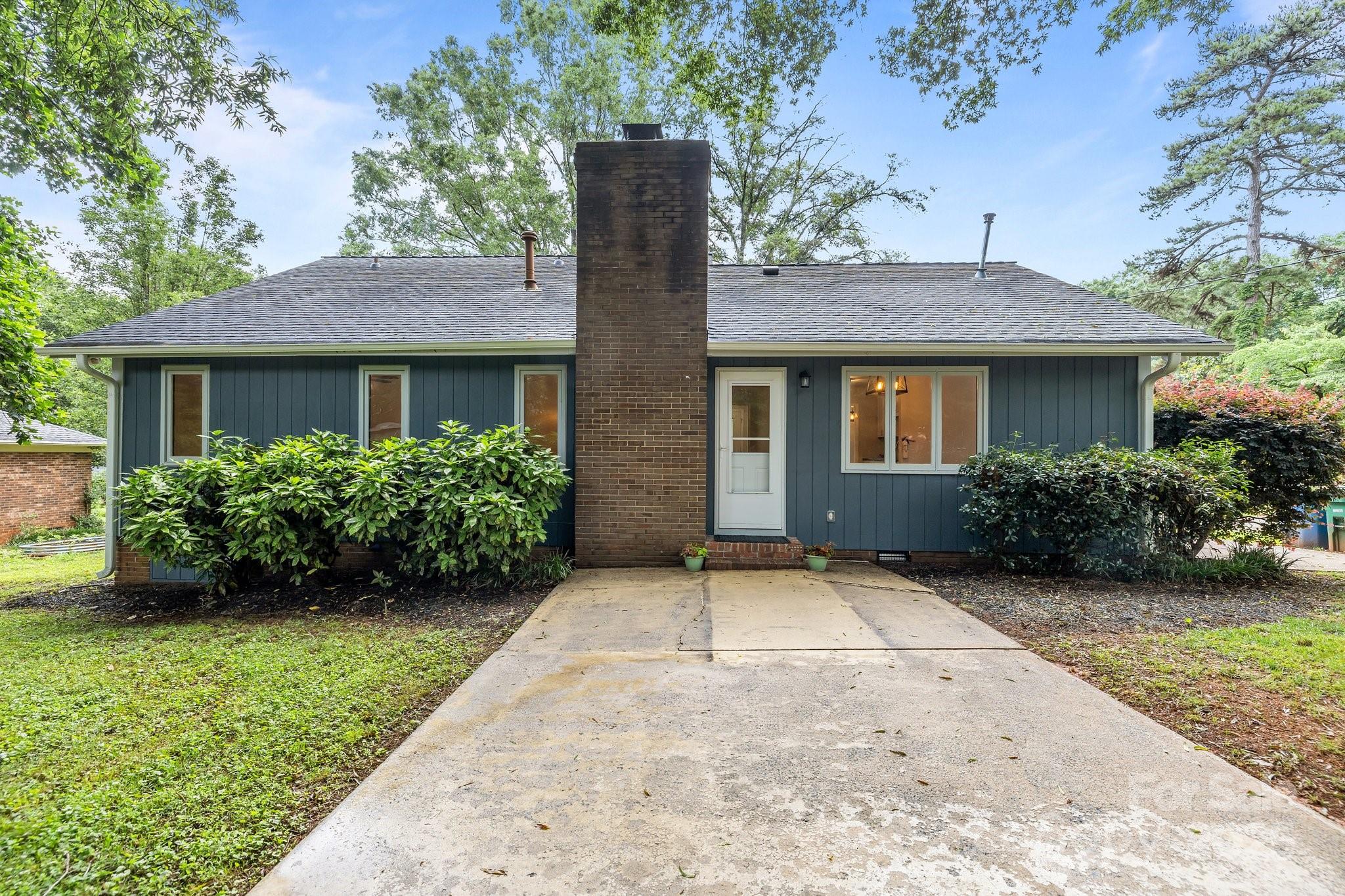 13446 Idlefield Lane Matthews, NC 28105 - Photo 29 of 42 front view of a house with a yard