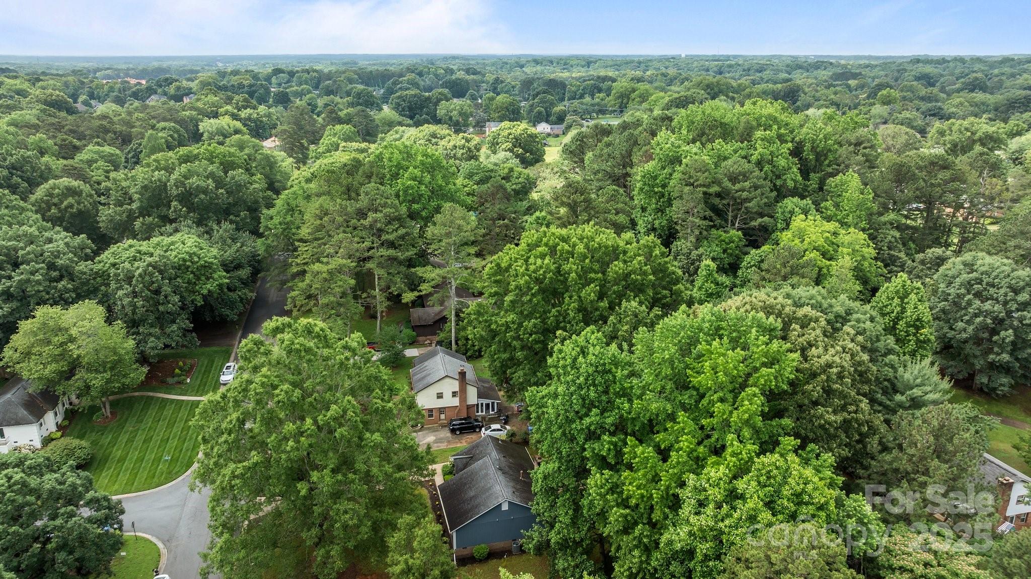 13446 Idlefield Lane Matthews, NC 28105 - Photo 39 of 42 an aerial view of a houses with a yard