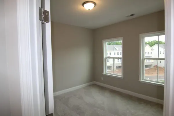 an empty room with windows