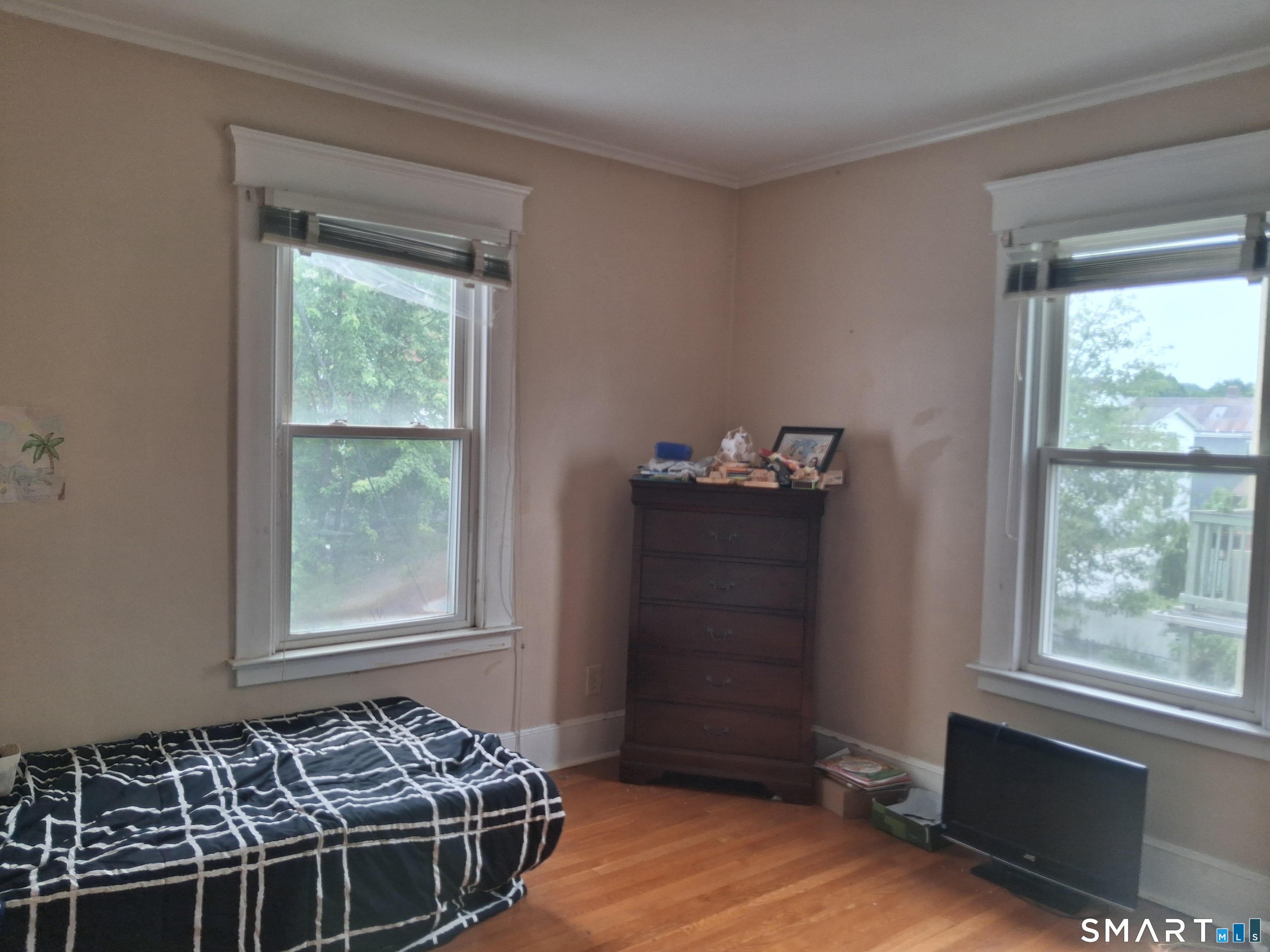 26 4th Street Hamden, CT 06514 - Photo 35 of 40 a bed room with a bed and a window