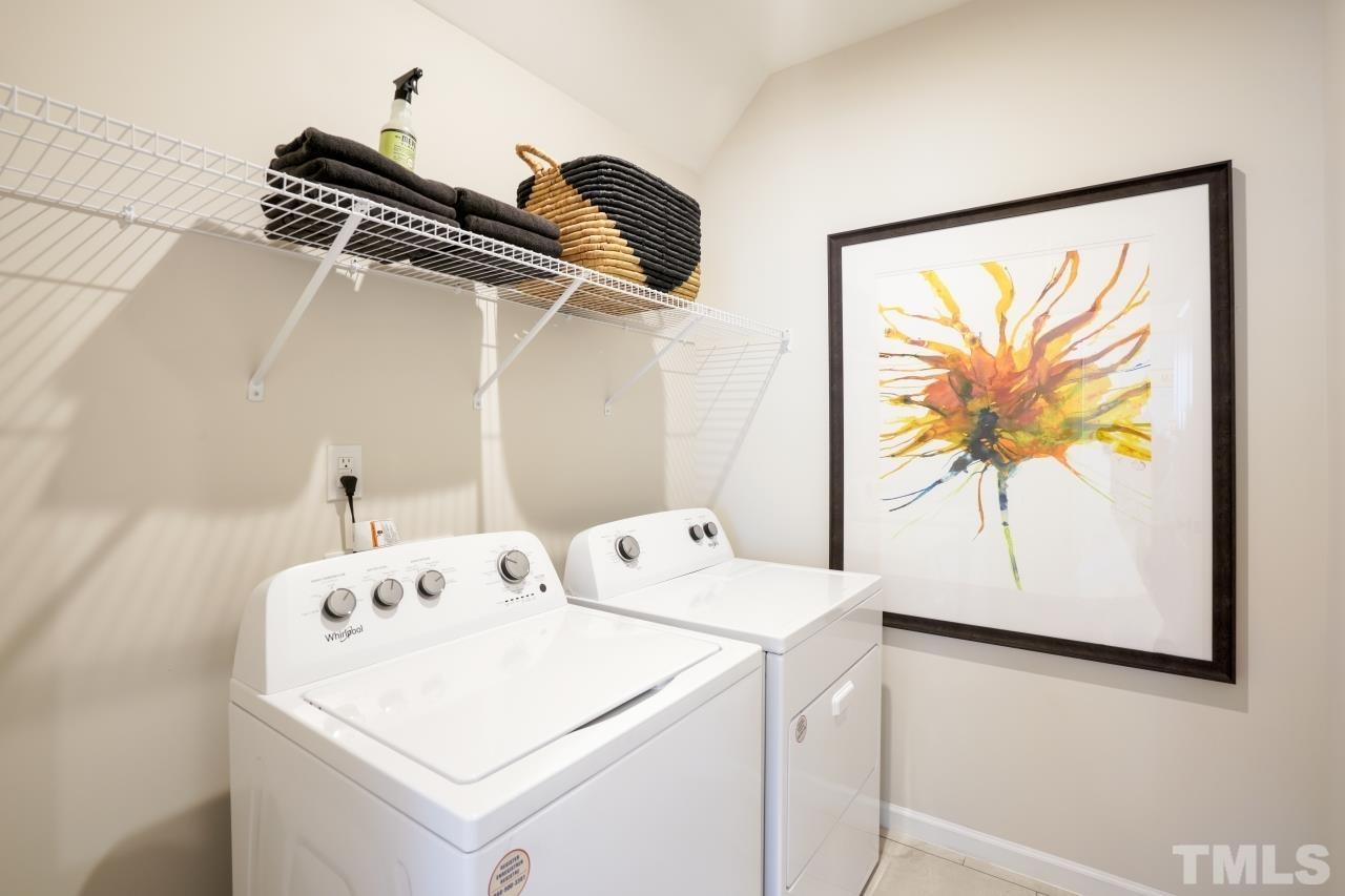232 Brody Pine Way Garner, NC 27529 - Photo 33 of 35 a utility room with dryer and washer