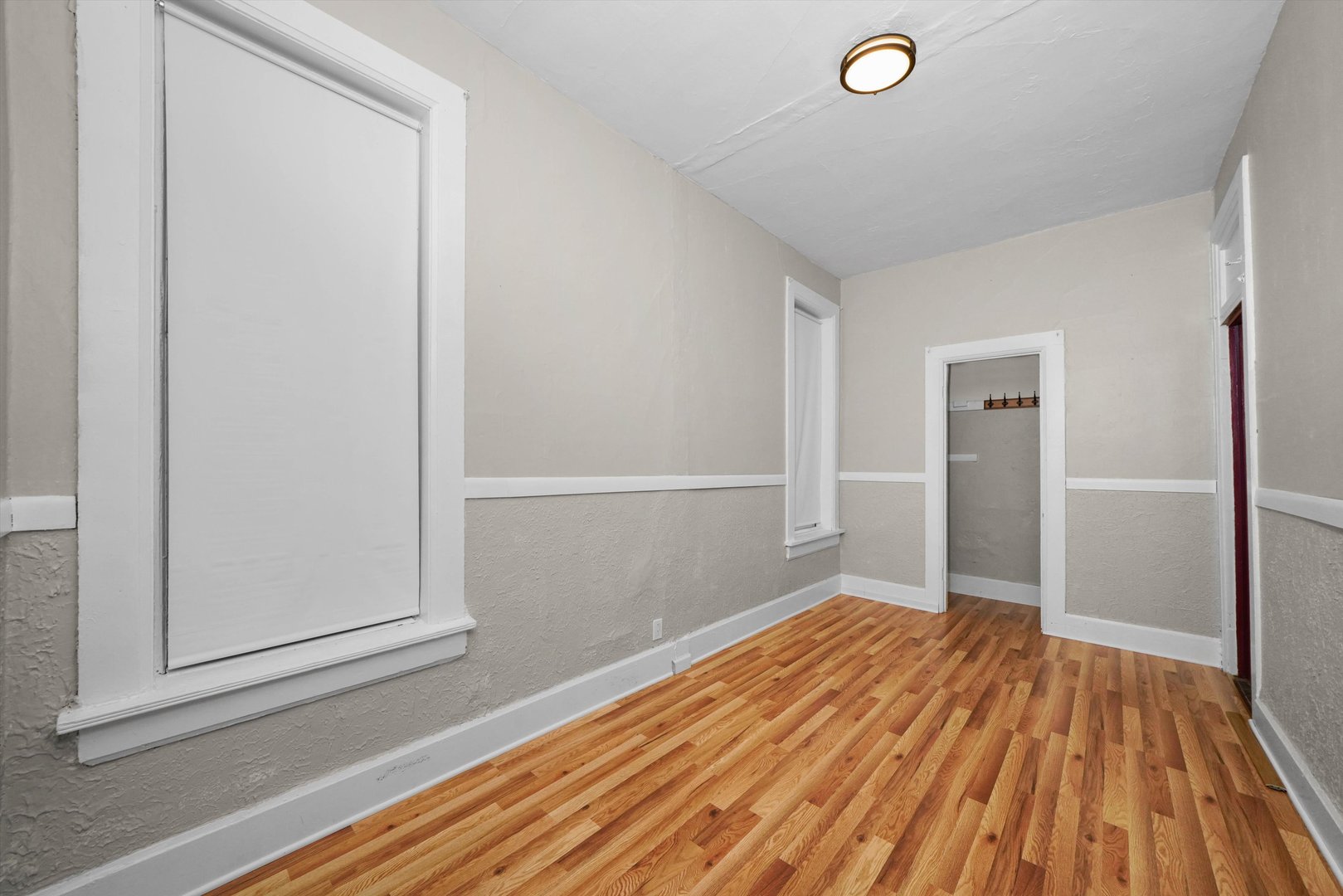 2140 West Cermak Road Chicago, IL 60608 - Photo 12 of 43 a view of a room with wooden floor and bathroom
