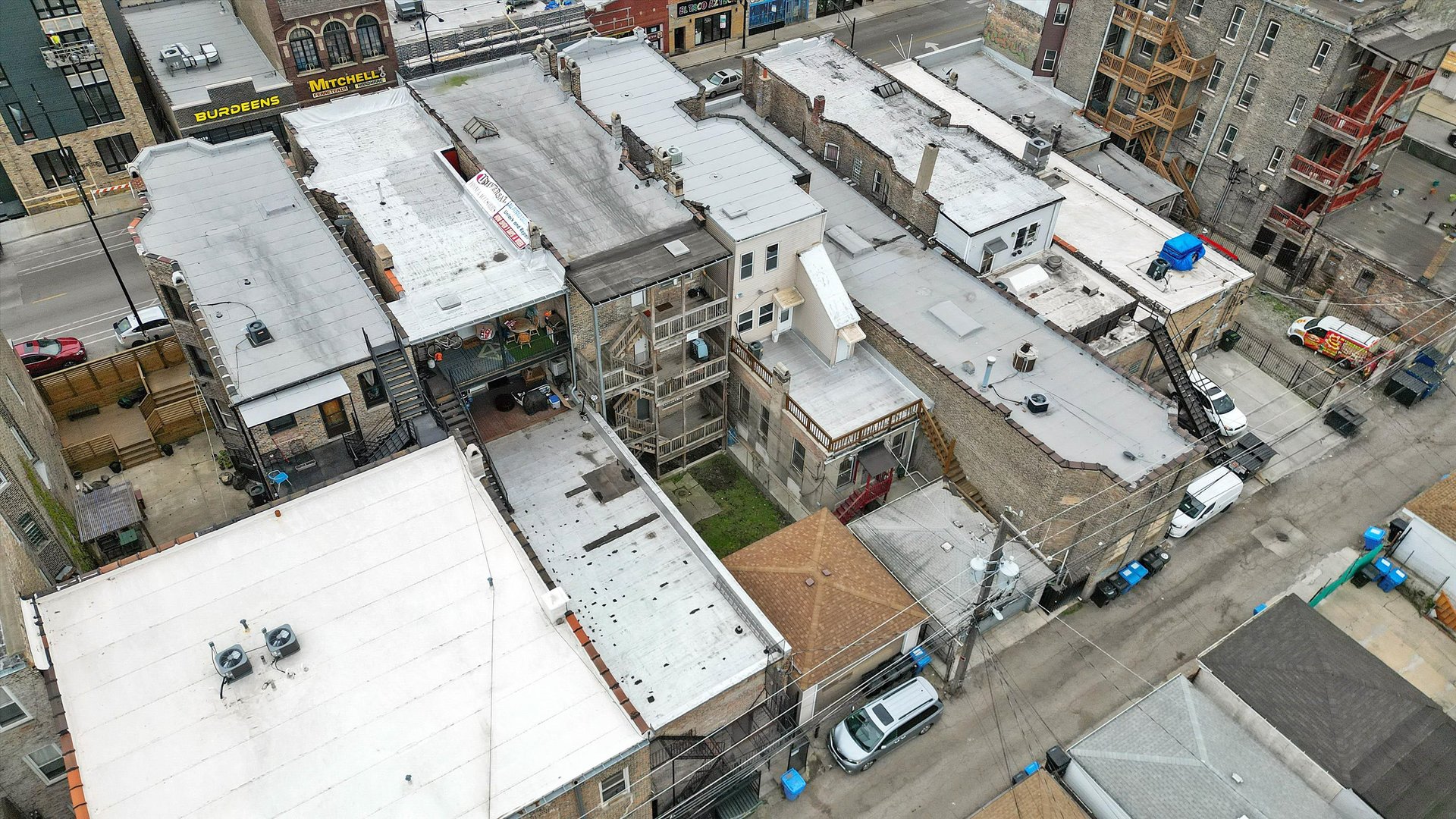 2140 West Cermak Road Chicago, IL 60608 - Photo 39 of 43 an aerial view of a residential apartment building with parking space