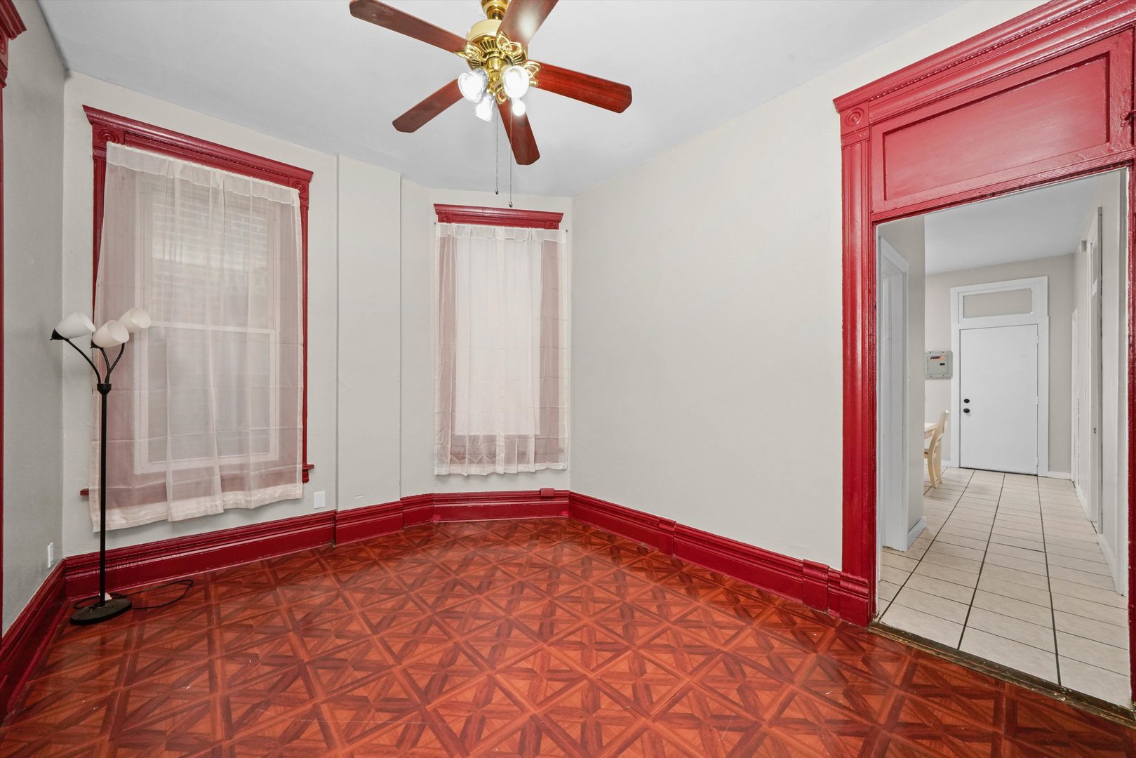 2140 West Cermak Road Chicago, IL 60608 - Photo 10 of 43 an empty room with a ceiling fan and a rug