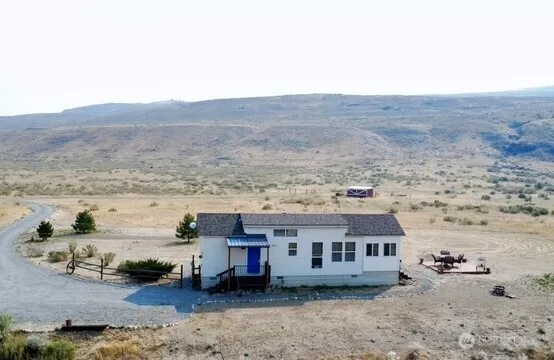an aerial view of house with outdoor space
