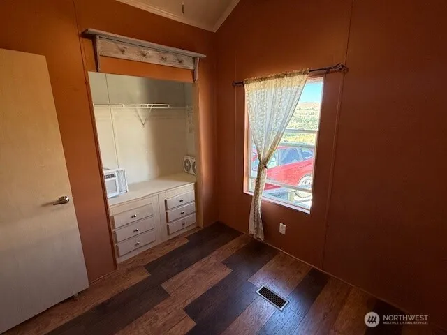 a kitchen with stainless steel appliances granite countertop a stove and a refrigerator