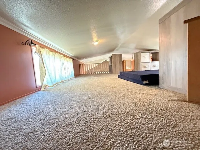 a bathroom with a toilet and a bathtub