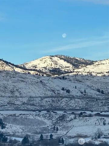 an aerial view of a house with outdoor space