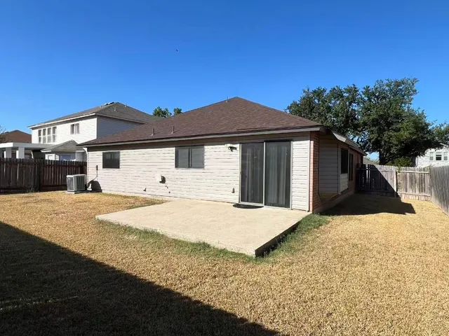 a front view of a house with yard