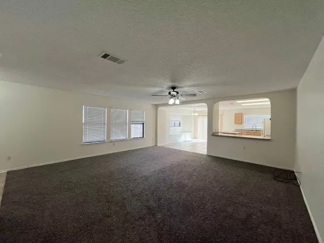 a view of a room that has a window