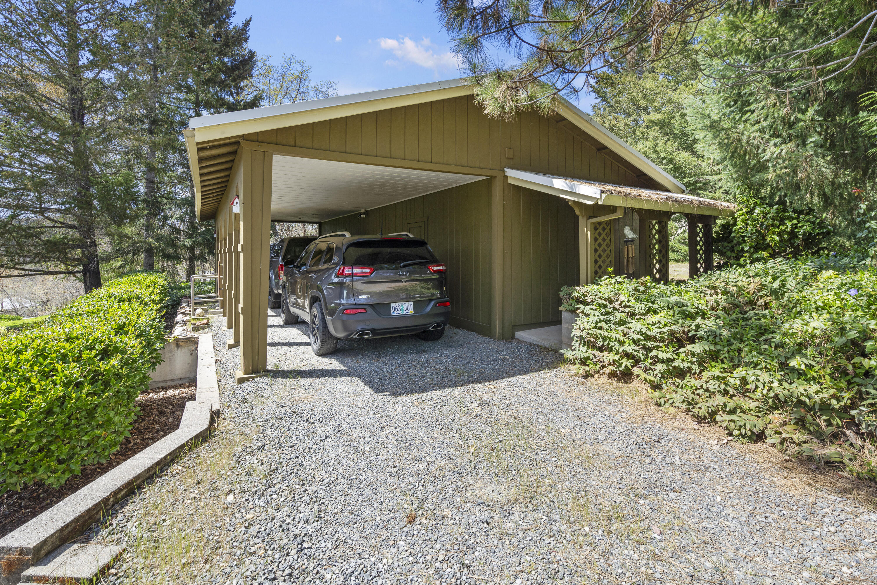 4874 Upper River Road Grants Pass, OR 97526 - Photo 48 of 66 a house view with a outdoor space