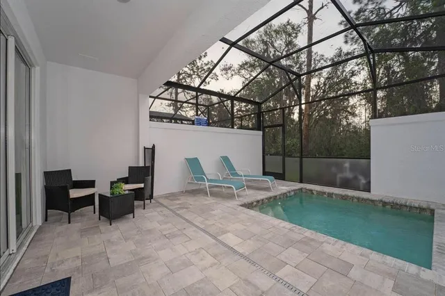 a view of outdoor space with seating area