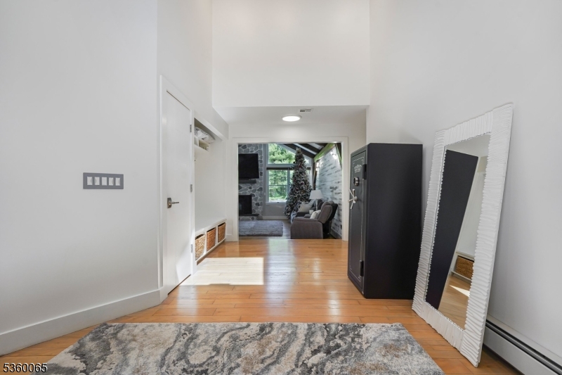 26 Danville Mountain Road Great Meadows, NJ 07838 - Photo 11 of 49 a view of a hallway with wooden floor and furniture