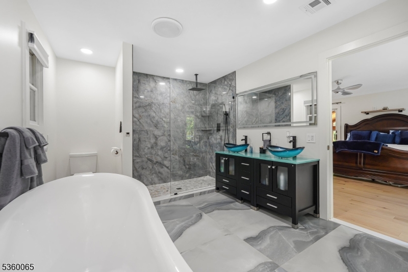 26 Danville Mountain Road Great Meadows, NJ 07838 - Photo 26 of 49 a bathroom with a tub sink mirror vanity and toilet