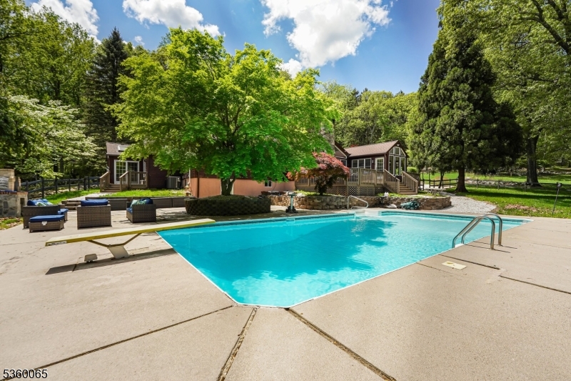 26 Danville Mountain Road Great Meadows, NJ 07838 - Photo 3 of 49 a view of a swimming pool with a patio
