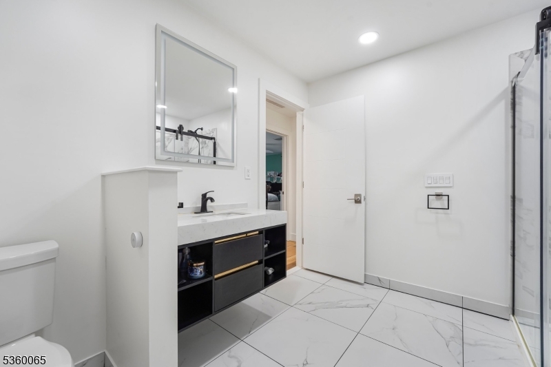 26 Danville Mountain Road Great Meadows, NJ 07838 - Photo 35 of 49 a bathroom with a sink and a mirror