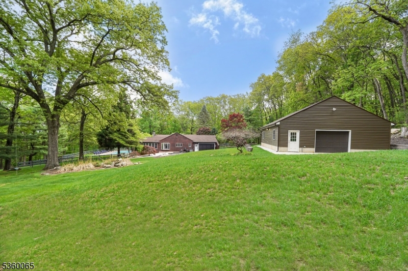 26 Danville Mountain Road Great Meadows, NJ 07838 - Photo 43 of 49 a front view of a house with a garden
