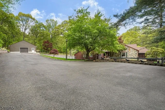 a view of a house with a street