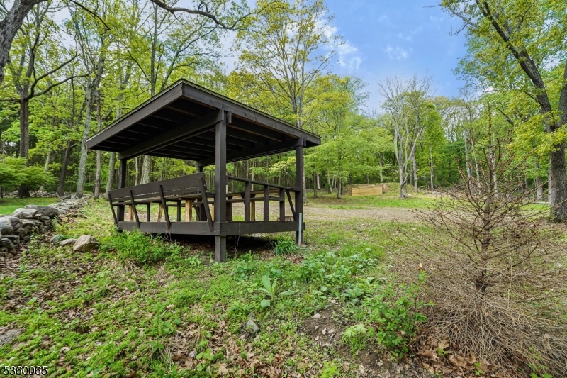 26 Danville Mountain Road Great Meadows, NJ 07838 - Photo 7 of 49 a view of a chair and table under an umbrella