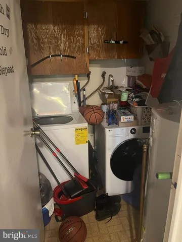 a white toilet sitting next to a bathroom sink