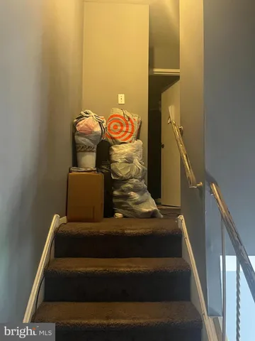 a view of a bedroom from a hallway