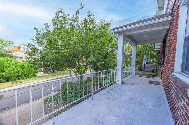 a view of a porch with a yard
