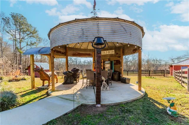 a view of a swimming pool with a patio