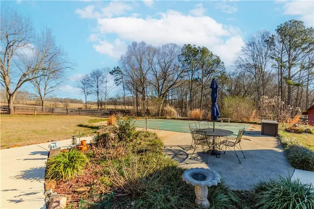 a view of a lake with a yard