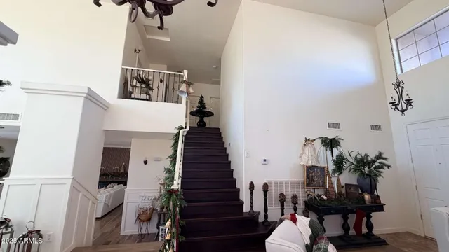 a view of a hallway with furniture and entryway