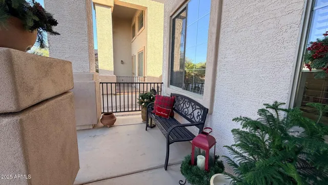 view of living room with furniture and floor to ceiling window
