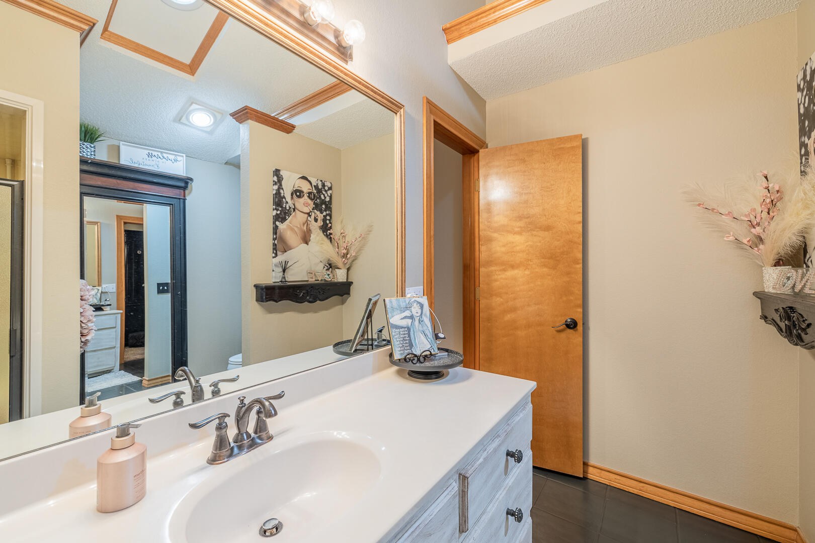 1005 N Avenue South Post, TX 79356 - Photo 17 of 49 a bathroom with a sink and a mirror