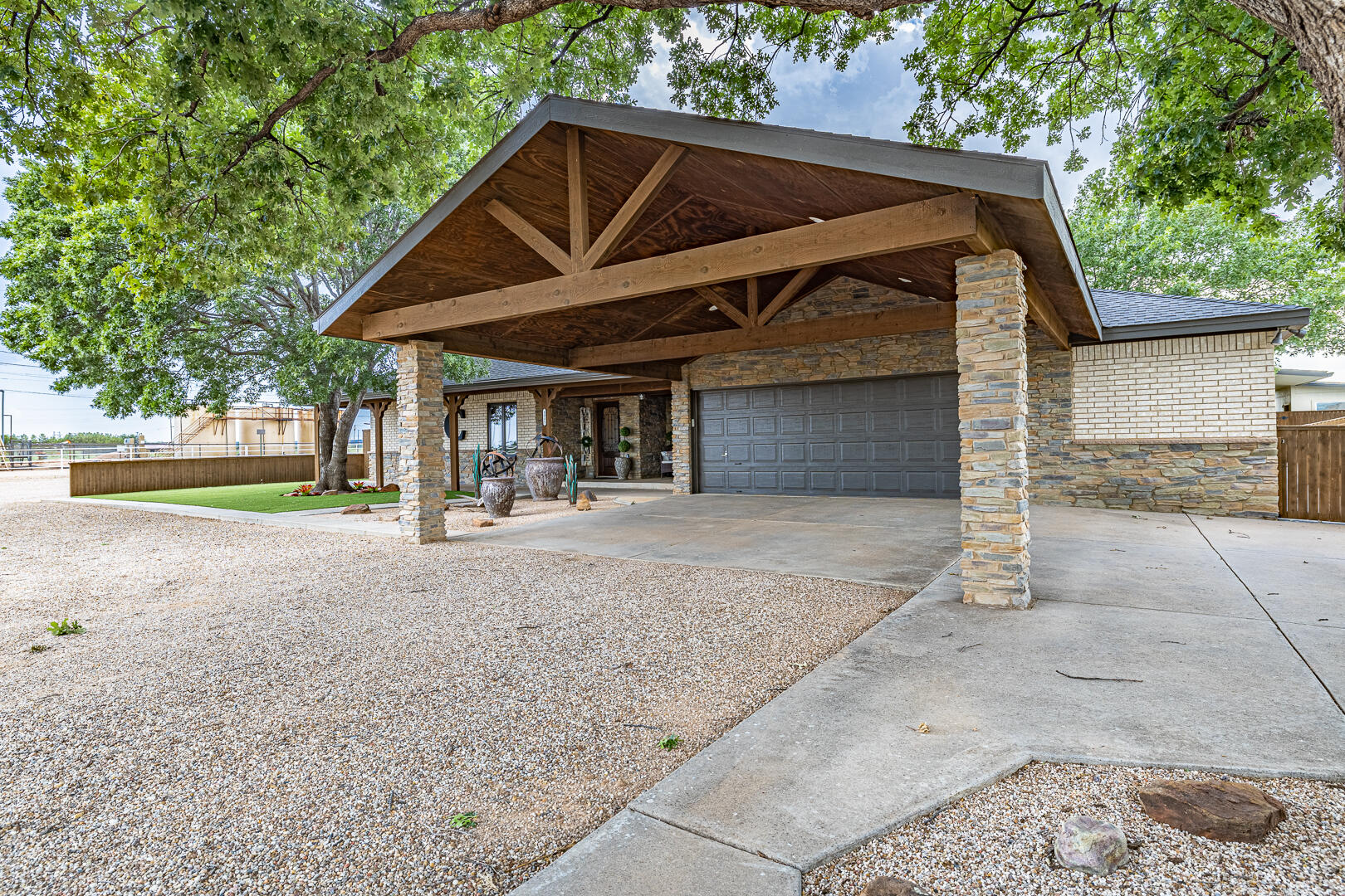 1005 N Avenue South Post, TX 79356 - Photo 2 of 49 a house with trees in the background