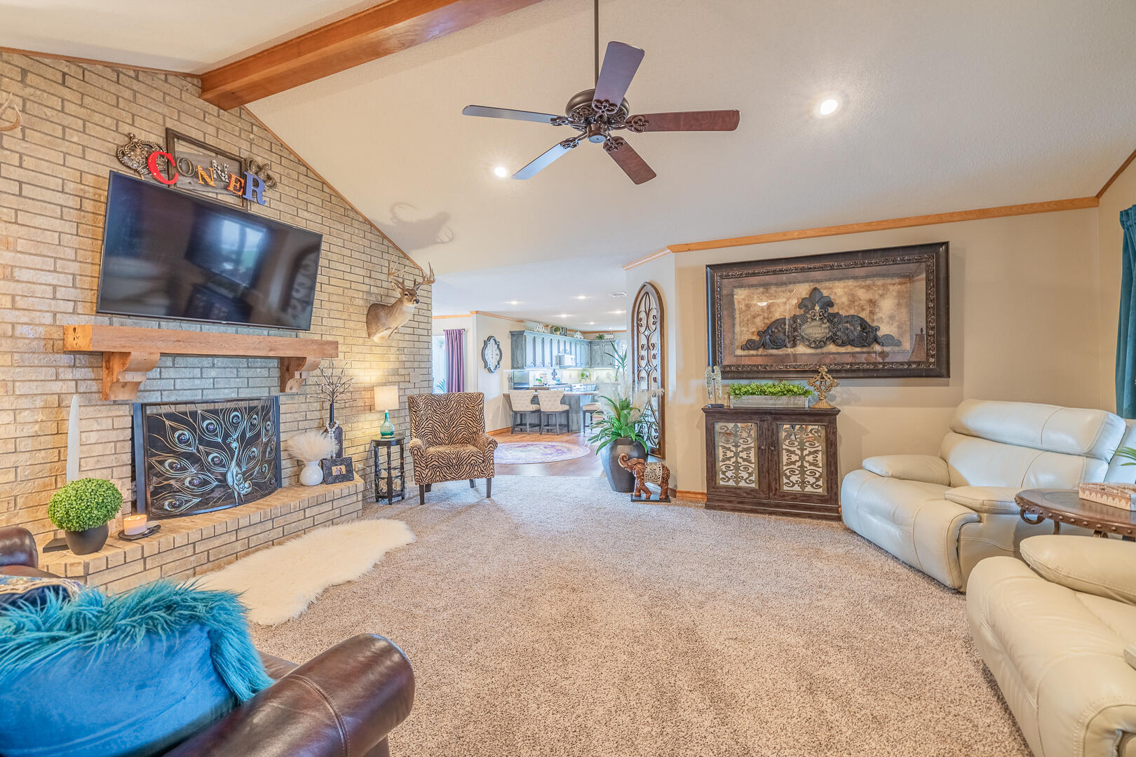 1005 N Avenue South Post, TX 79356 - Photo 24 of 49 a living room with furniture and a fireplace