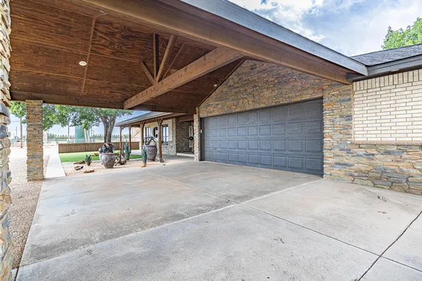 a view of a house with a garage