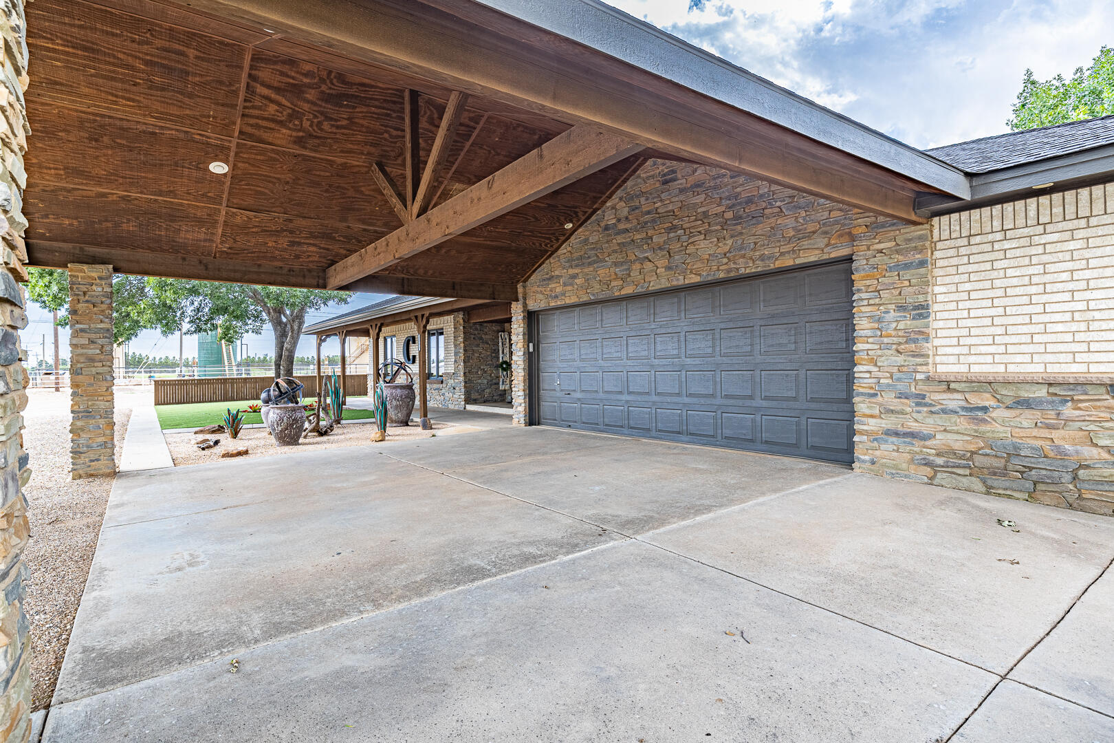1005 N Avenue South Post, TX 79356 - Photo 3 of 49 a view of a house with a garage