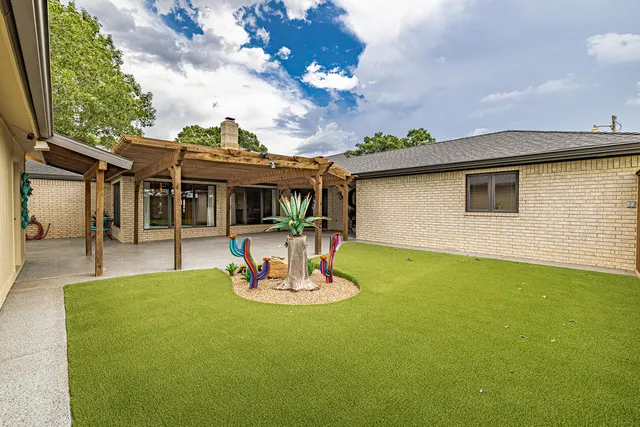 a view of a table and chairs in patio