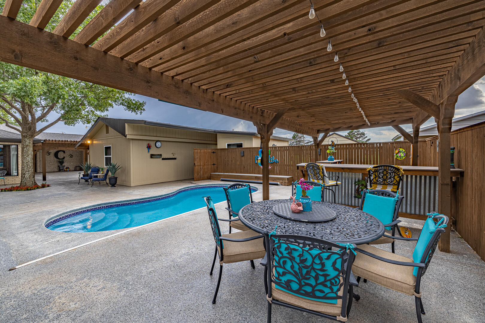 1005 N Avenue South Post, TX 79356 - Photo 39 of 49 a view of a table and chairs in patio