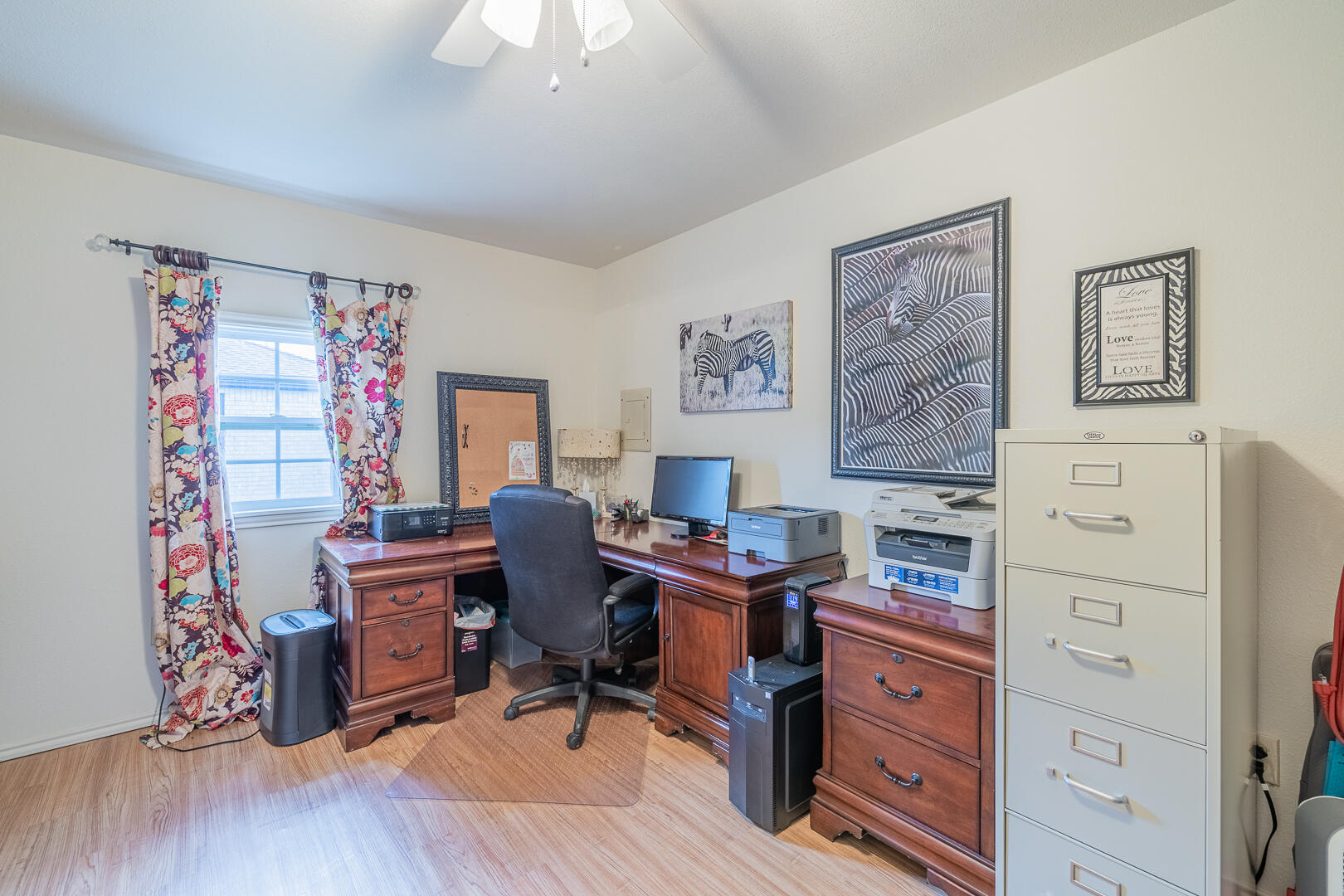 1005 N Avenue South Post, TX 79356 - Photo 45 of 49 a view of a workspace with furniture and a window