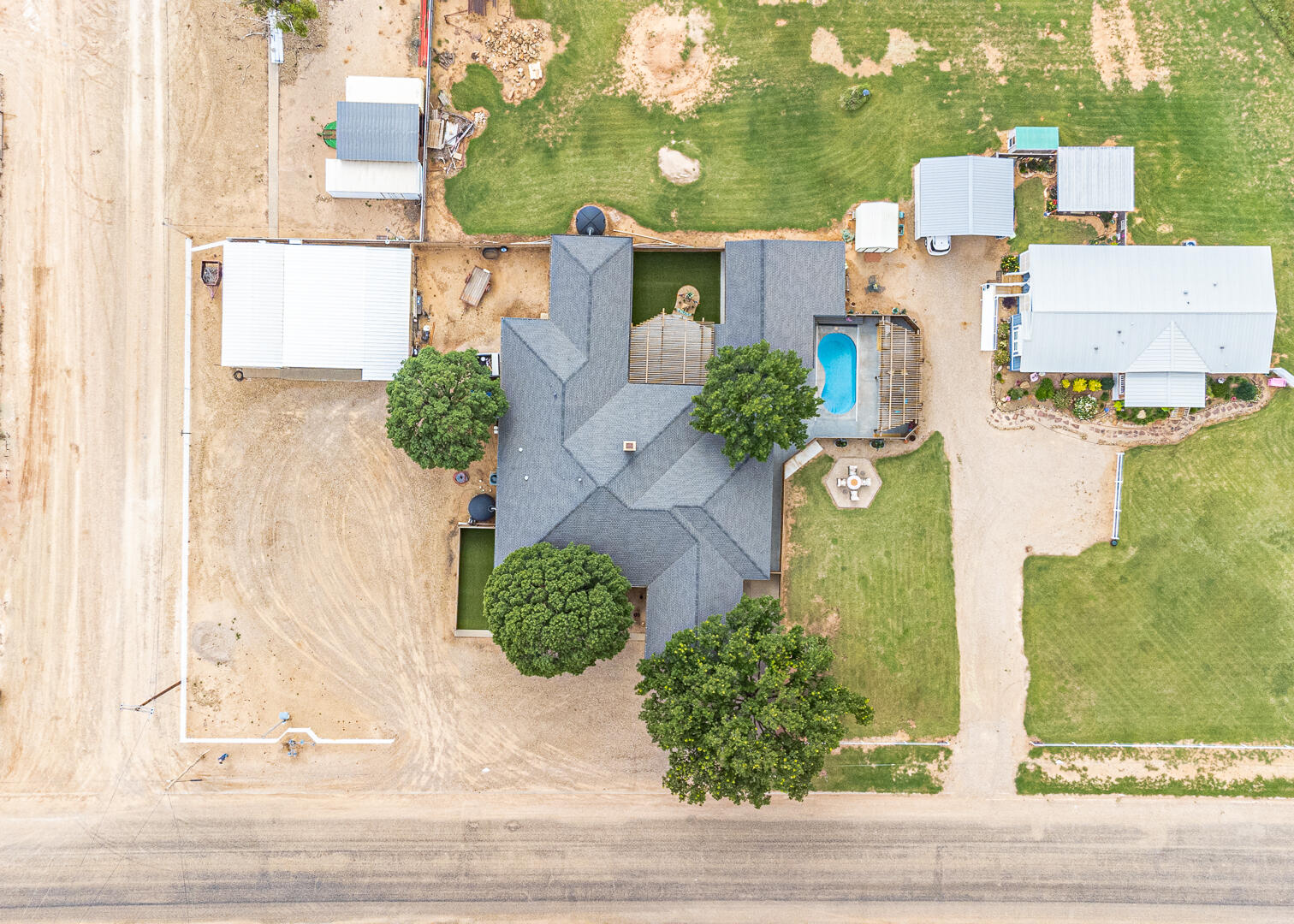 1005 N Avenue South Post, TX 79356 - Photo 48 of 49 front view of a house with a street