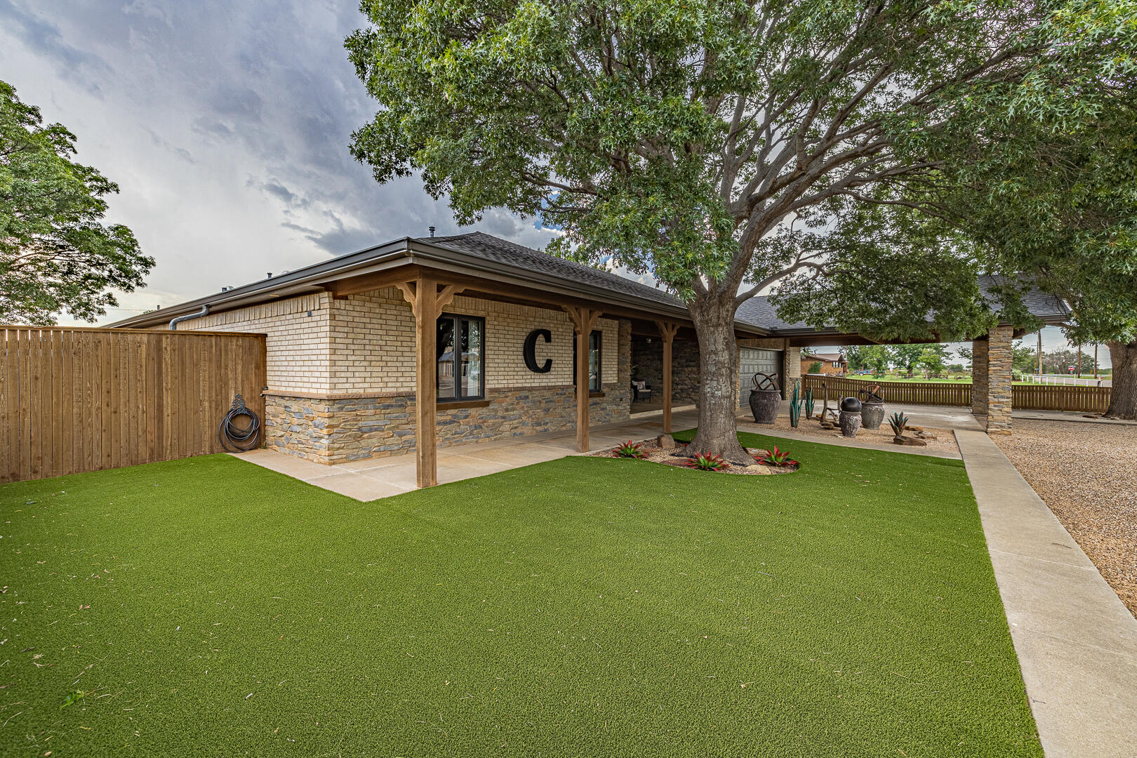 1005 N Avenue South Post, TX 79356 - Photo 5 of 49 a front view of a house with garden