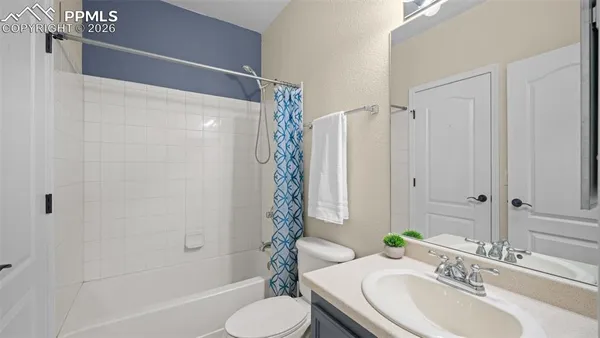 a kitchen with stainless steel appliances a refrigerator stove microwave and sink