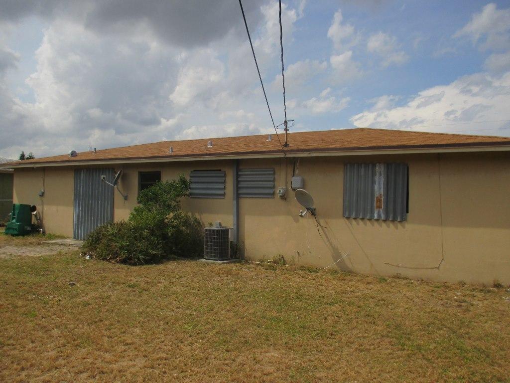311 West 24th Street Riviera Beach, FL 33404 - Photo 14 of 14 Exterior Back