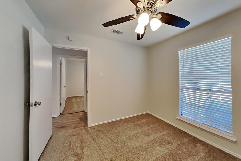 7809 Meadowlark Lane Rowlett, TX 75088 - Photo 11 of 18 wooden floor in an empty room